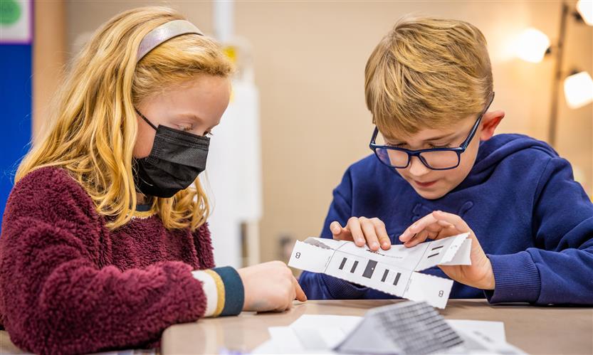 Students make paper houses